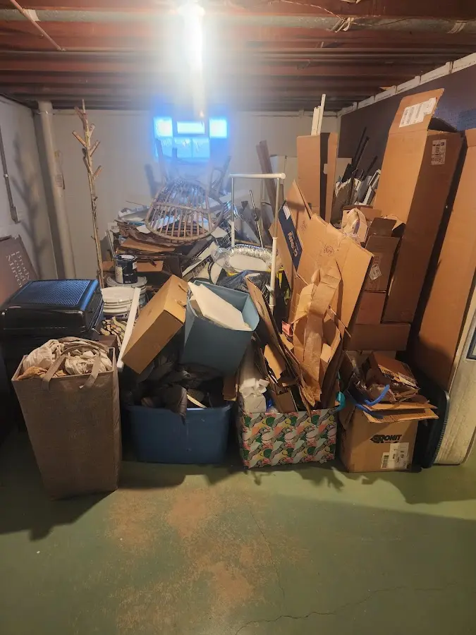 Roll-off dumpster container at job site for 4 Yard Dumpster Rental in Kennett